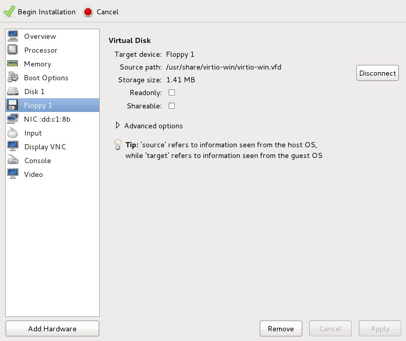 The virtual machine hardware information window with the target device (Floppy 1) selected.